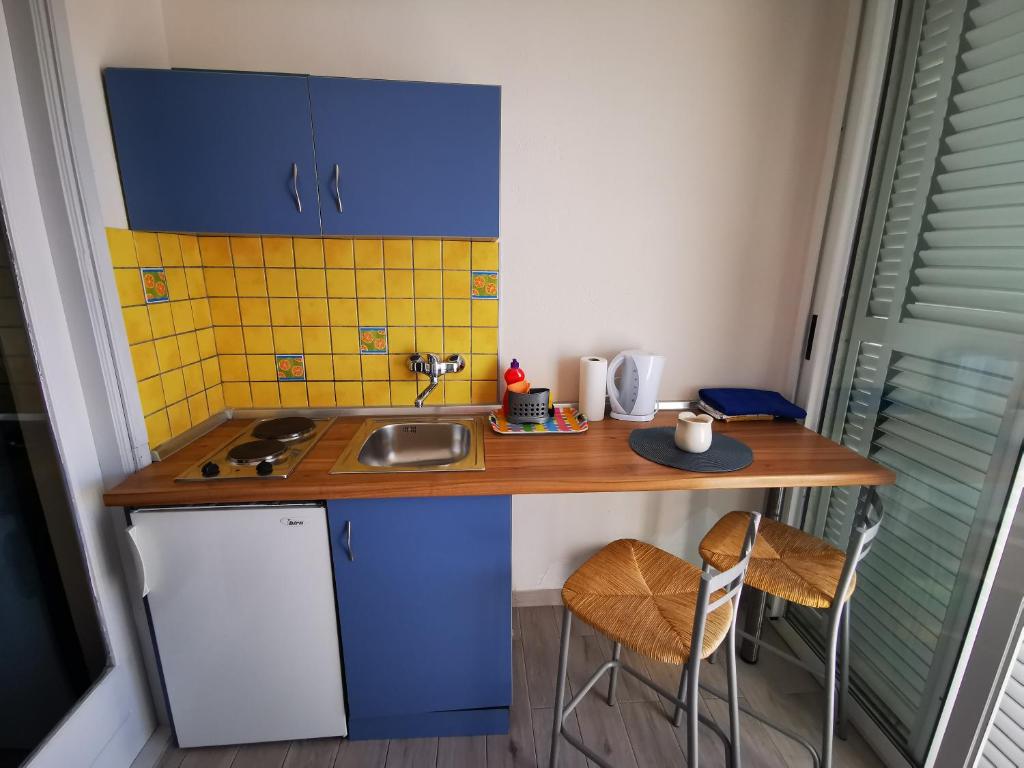 Kuchyňa alebo kuchynka v ubytovaní Villa Bose- Apartmani Luka Šodan