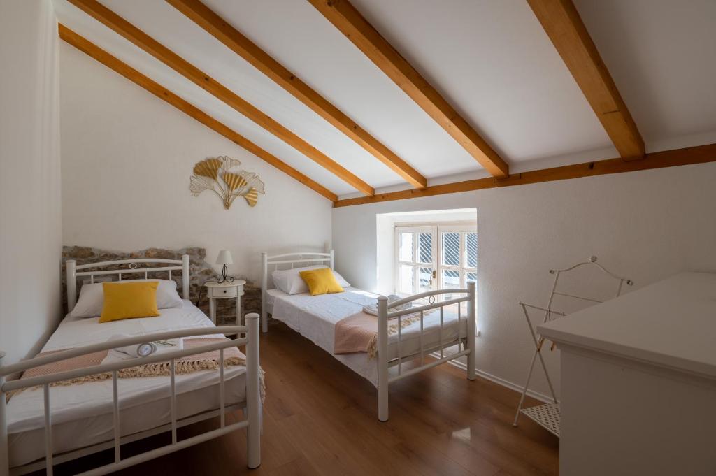 Katil atau katil-katil dalam bilik di Villa Perliano