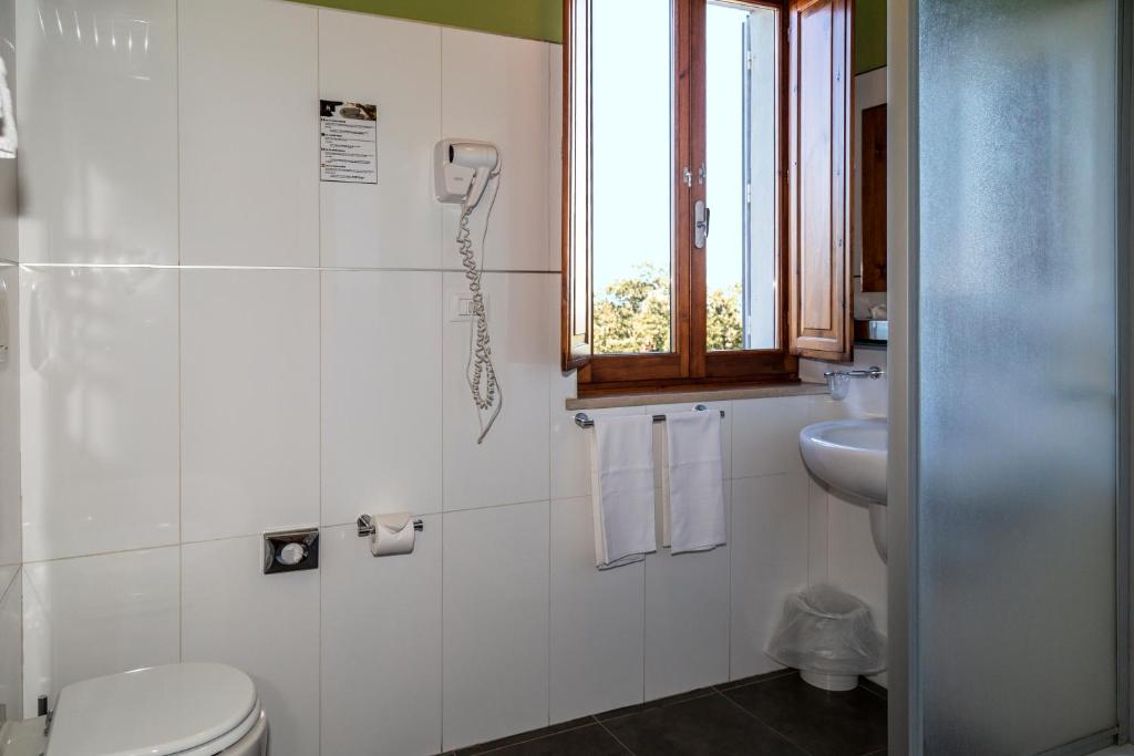 Kúpeľňa v ubytovaní Villa Montarioso