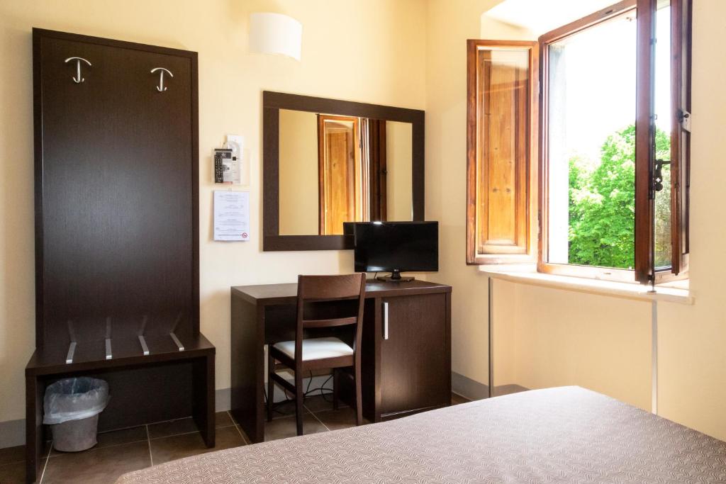 Posteľ alebo postele v izbe v ubytovaní Villa Montarioso