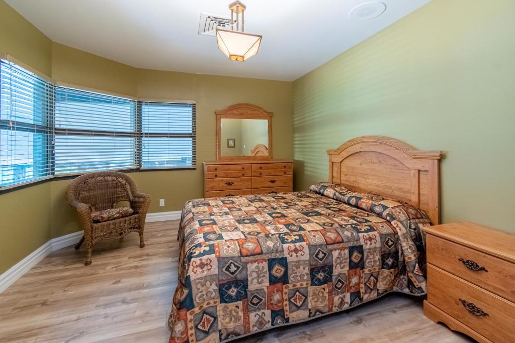 Ένα ή περισσότερα κρεβάτια σε δωμάτιο στο Condo avec parc aquatique !