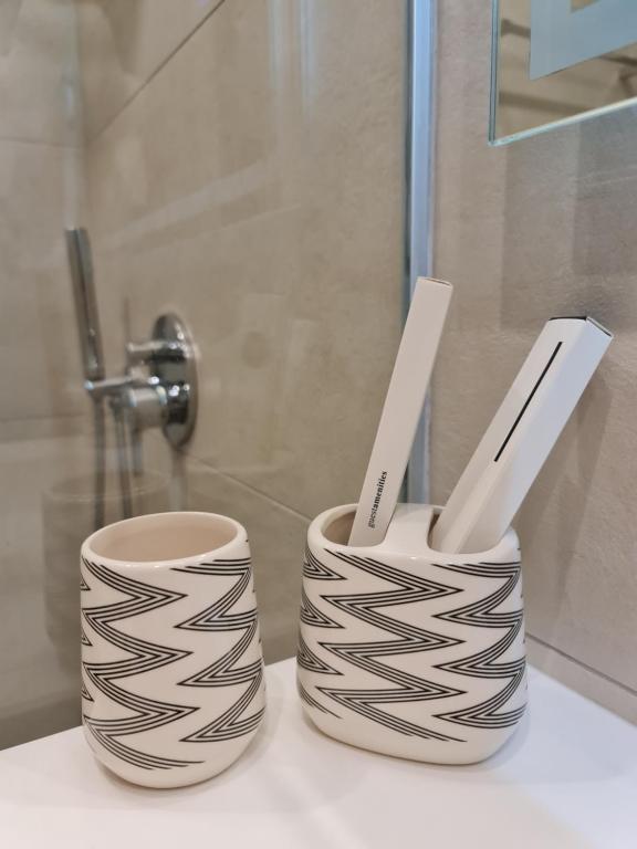 Koupelna v ubytování Hotel Aross