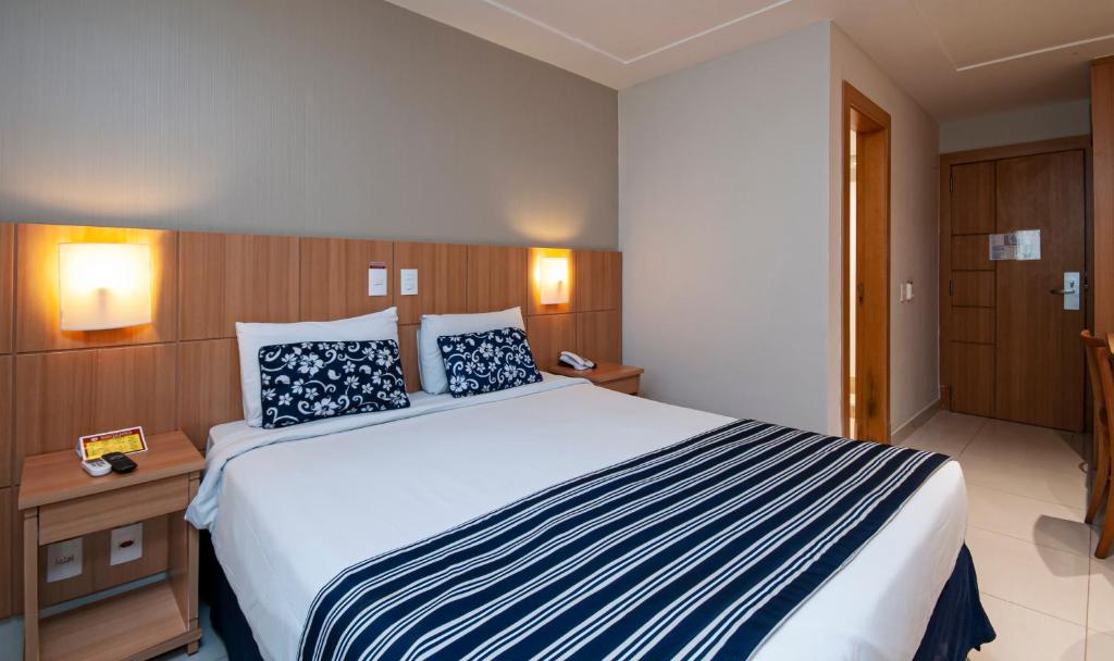 Postel nebo postele na pokoji v ubytování Hotel Atlântico Rio