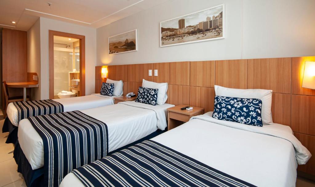 Postel nebo postele na pokoji v ubytování Hotel Atlântico Rio