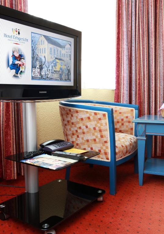 Posezení v ubytování Hotel Erbgericht Buntes Haus