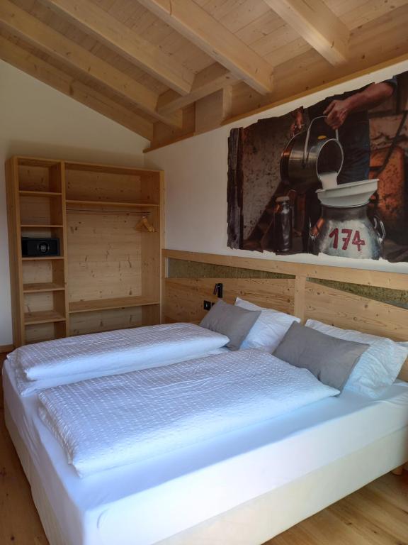 Postel nebo postele na pokoji v ubytování Agriturismo Maso Schneider