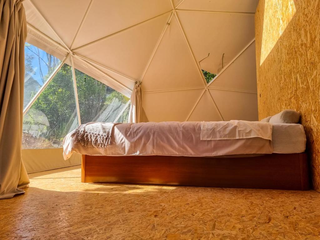 Postel nebo postele na pokoji v ubytování Quinta do Abacate - Glamping Park