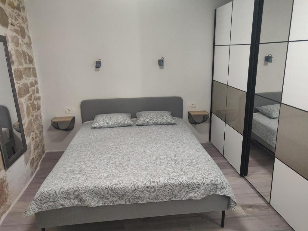 Postel nebo postele na pokoji v ubytování Split Stone