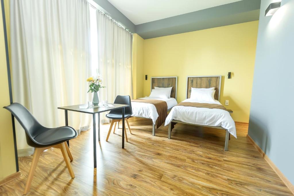 Postel nebo postele na pokoji v ubytování STARK HOTEL