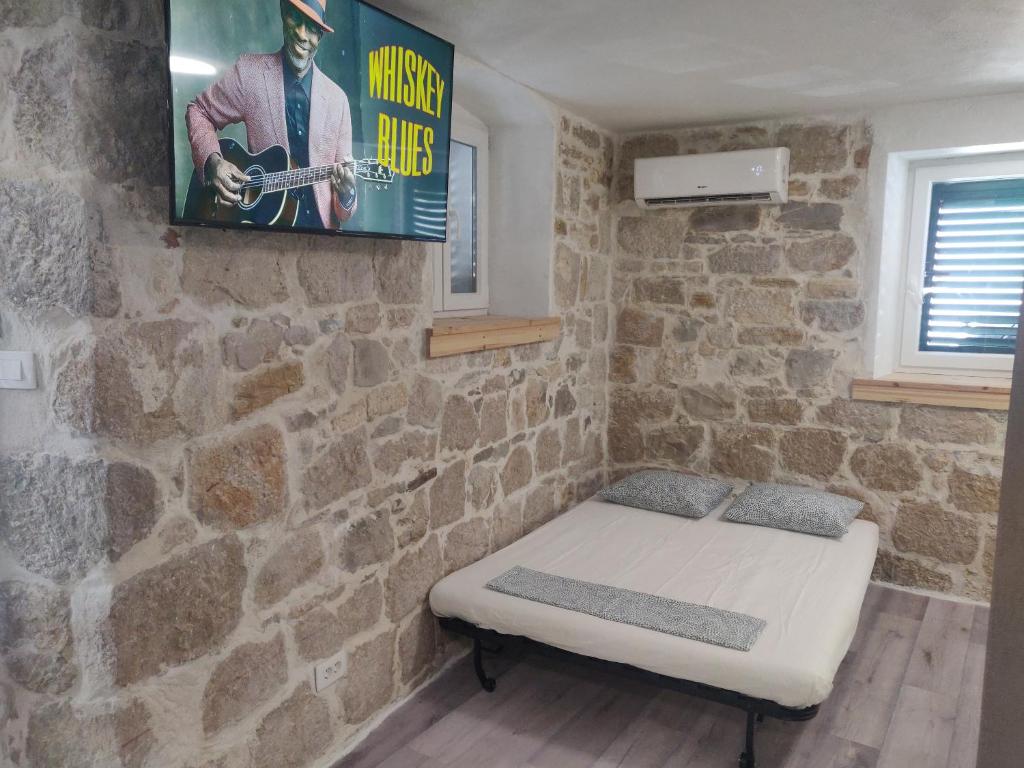 Postel nebo postele na pokoji v ubytování Split Stone