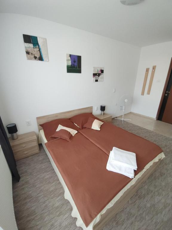 Posteľ alebo postele v izbe v ubytovaní Fiesta Apartman