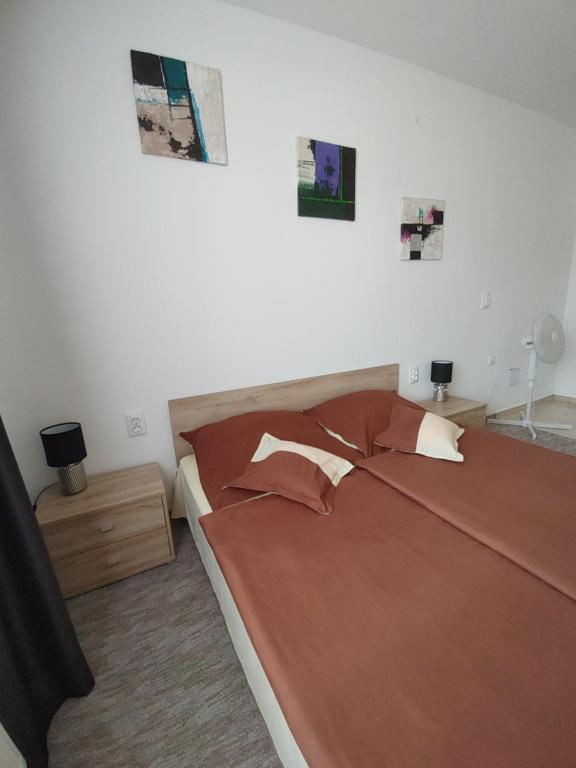Posteľ alebo postele v izbe v ubytovaní Fiesta Apartman