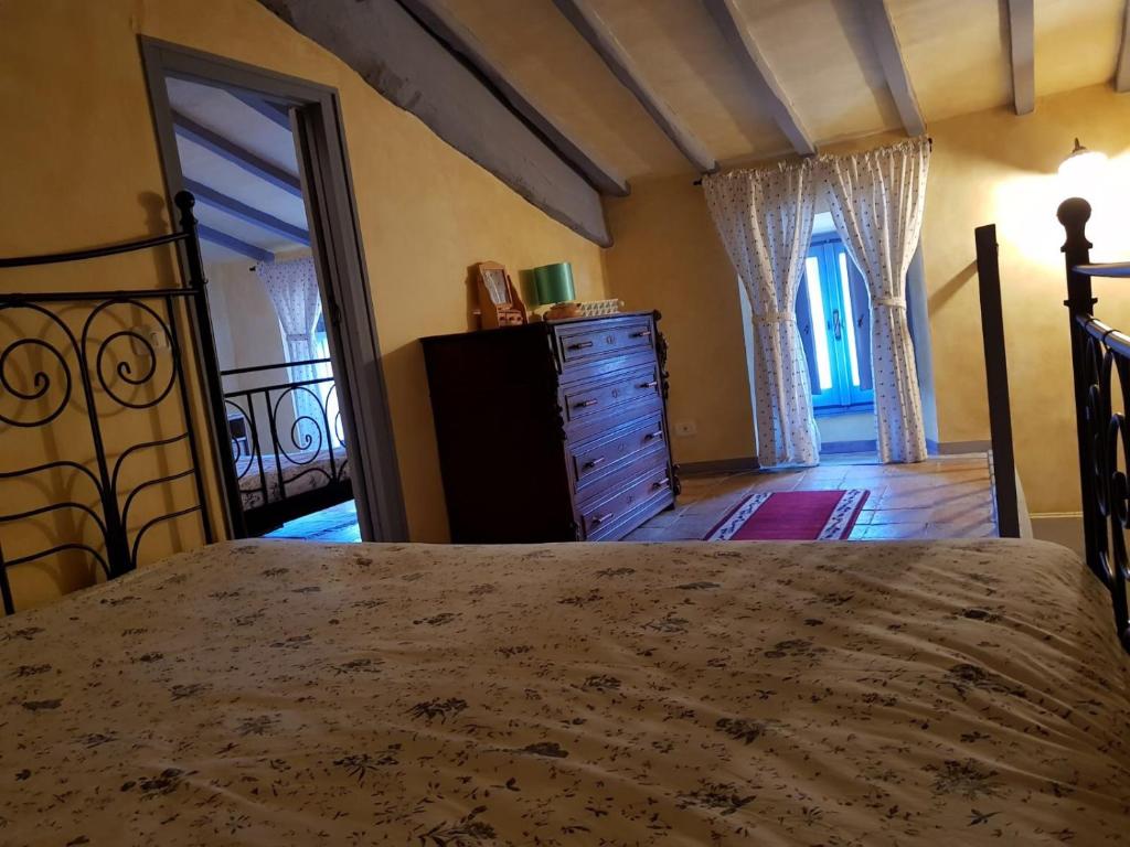 A bed or beds in a room at Maison Dina
