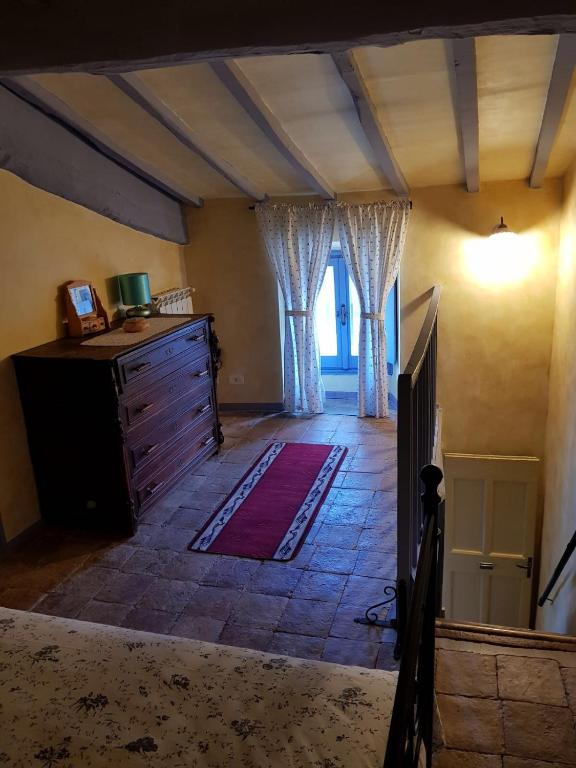 A bed or beds in a room at Maison Dina