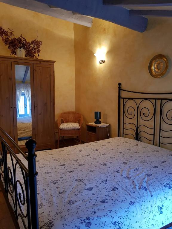 A bed or beds in a room at Maison Dina