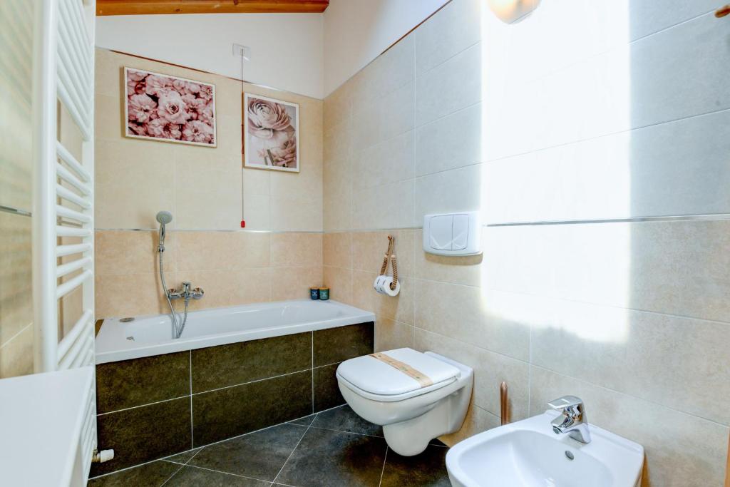 Kúpeľňa v ubytovaní Rosa del Lago Apartment