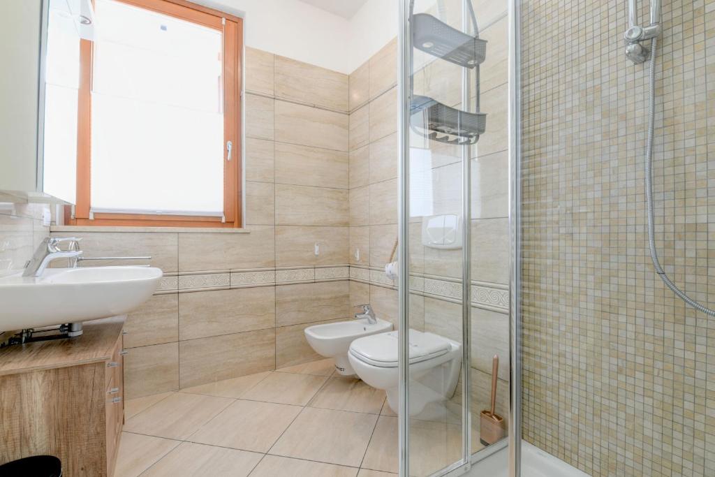 Kúpeľňa v ubytovaní Rosa del Lago Apartment