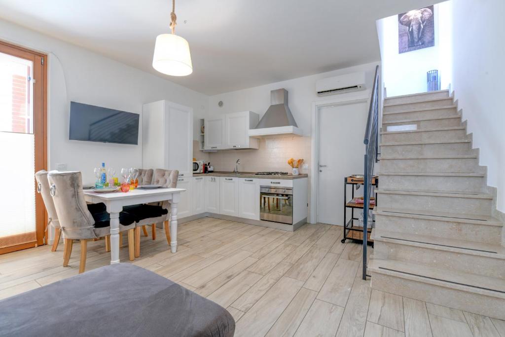 Kuchyňa alebo kuchynka v ubytovaní Rosa del Lago Apartment