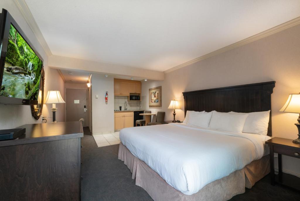 Postel nebo postele na pokoji v ubytování Prestige Inn Nelson
