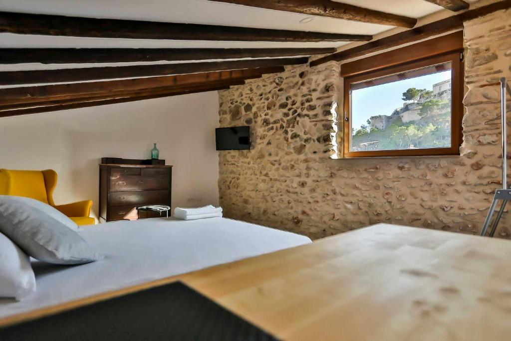 Posteľ alebo postele v izbe v ubytovaní Casa Bitibau