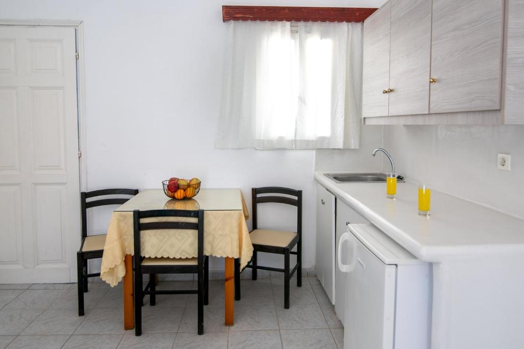 Kuchyň nebo kuchyňský kout v ubytování Gardenia Hotel