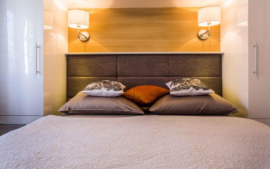 Posteľ alebo postele v izbe v ubytovaní Apartments in Silo/Insel Krk 13482