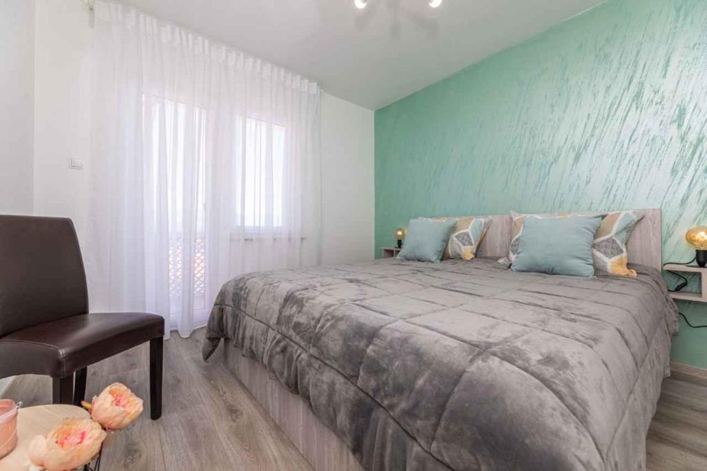 Postel nebo postele na pokoji v ubytování Apartment in Silo - Insel Krk 13505