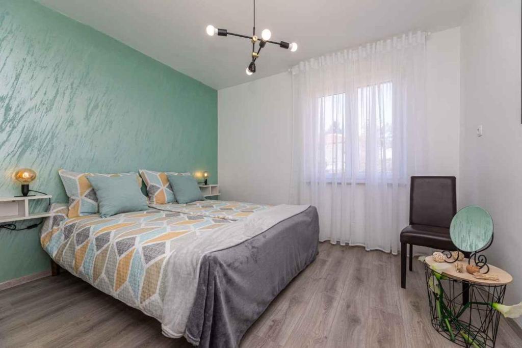 Postel nebo postele na pokoji v ubytování Apartment in Silo - Insel Krk 13505