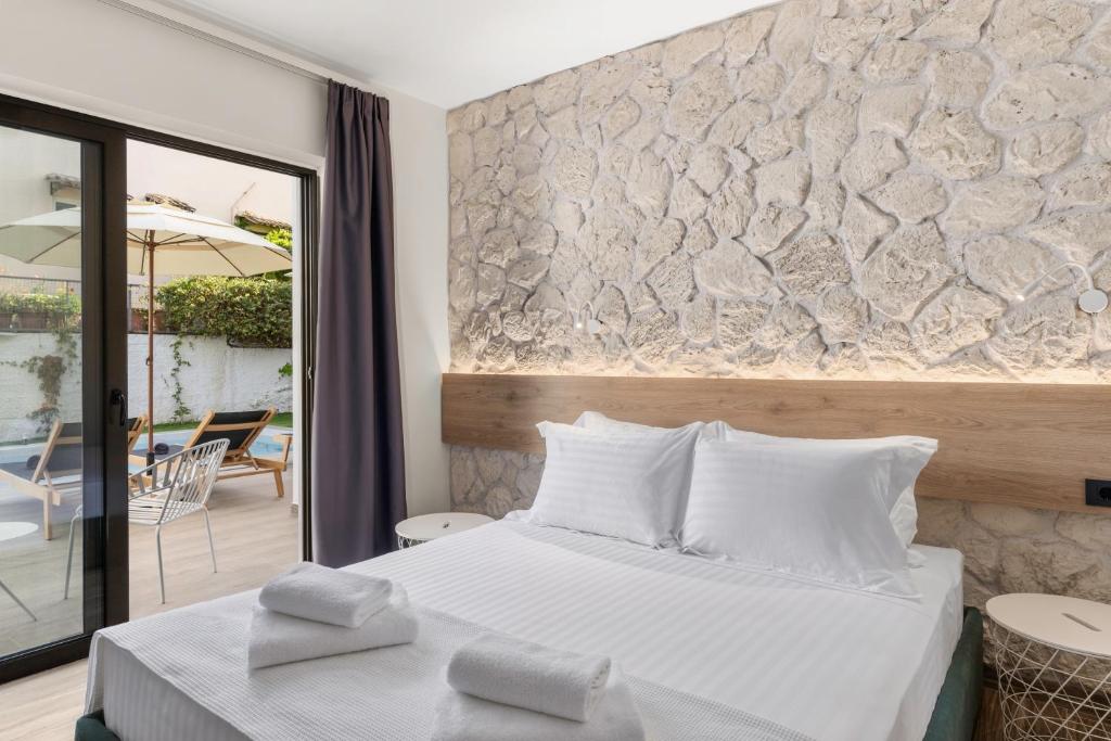 Posteľ alebo postele v izbe v ubytovaní Sigma Luxury Rooms