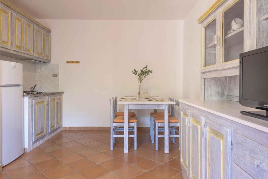Kuchnia lub aneks kuchenny w obiekcie Holiday home in Golfo Aranci 30357