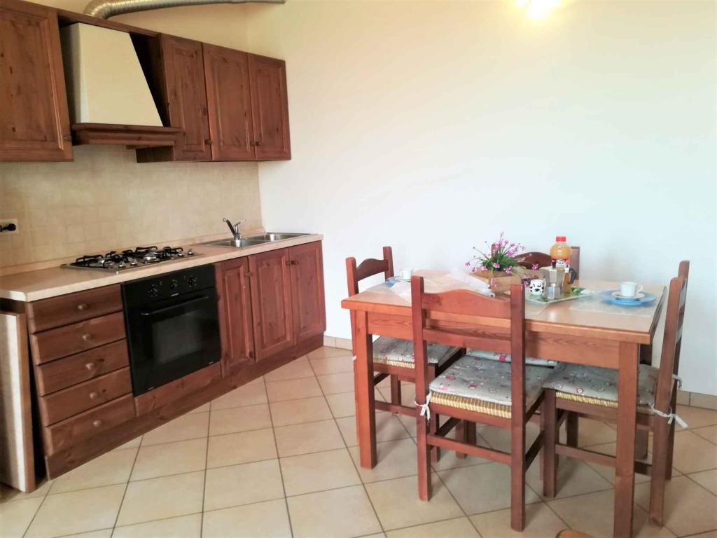 A kitchen or kitchenette at Apartments in Ariano nel Polesine 24954