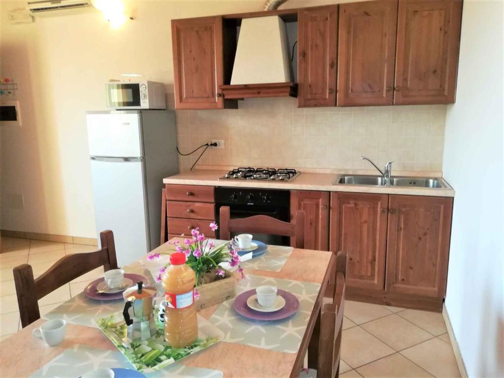 A kitchen or kitchenette at Apartments in Ariano nel Polesine 24954