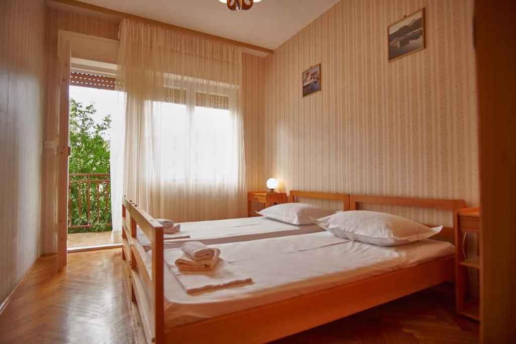 Posteľ alebo postele v izbe v ubytovaní Apartment in Vinisce 7417