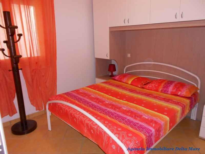 Łóżko lub łóżka w pokoju w obiekcie Apartment in Rosolina Mare 24935