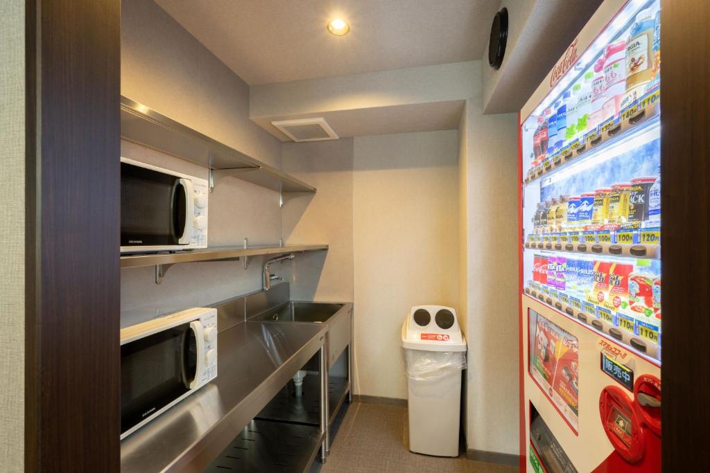 Kuchyň nebo kuchyňský kout v ubytování Fuji Hotel Kyoto Gojo
