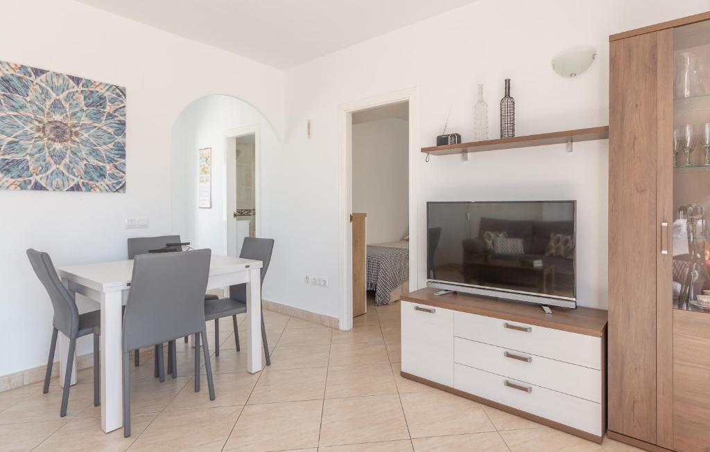TV a/nebo společenská místnost v ubytování Pondarosa Penthouse 55 - Costa CarpeDiem