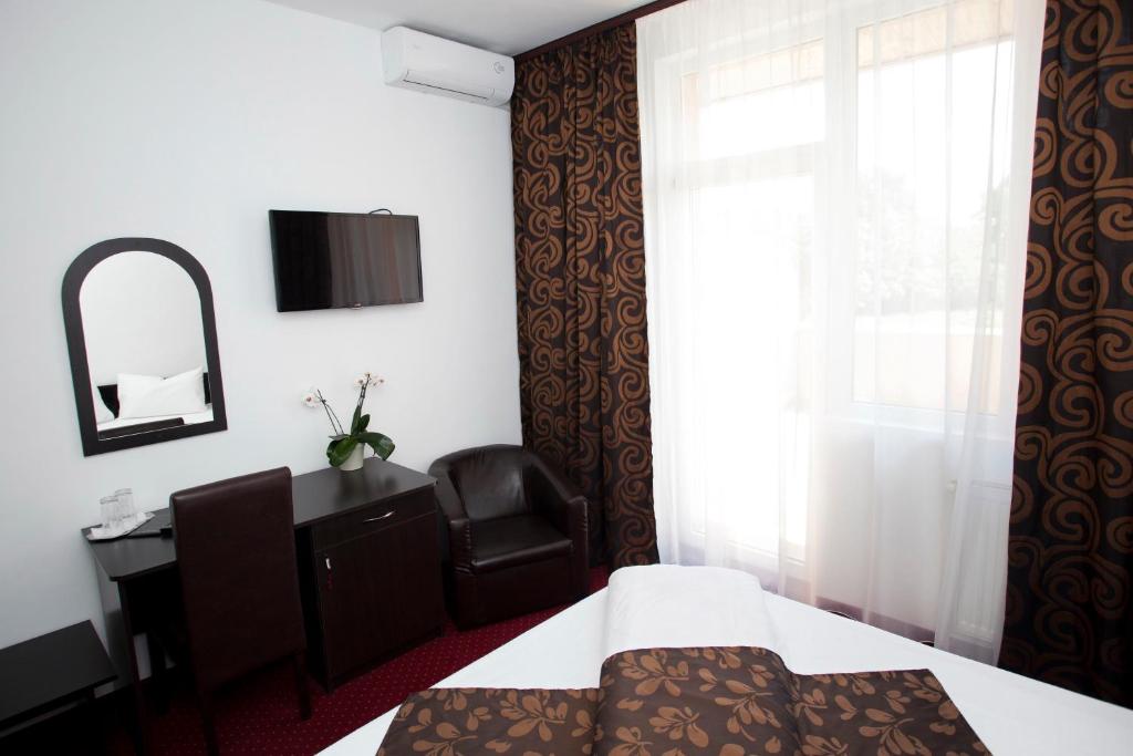 Postel nebo postele na pokoji v ubytování Hotel Terra