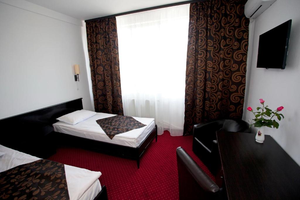 Postel nebo postele na pokoji v ubytování Hotel Terra