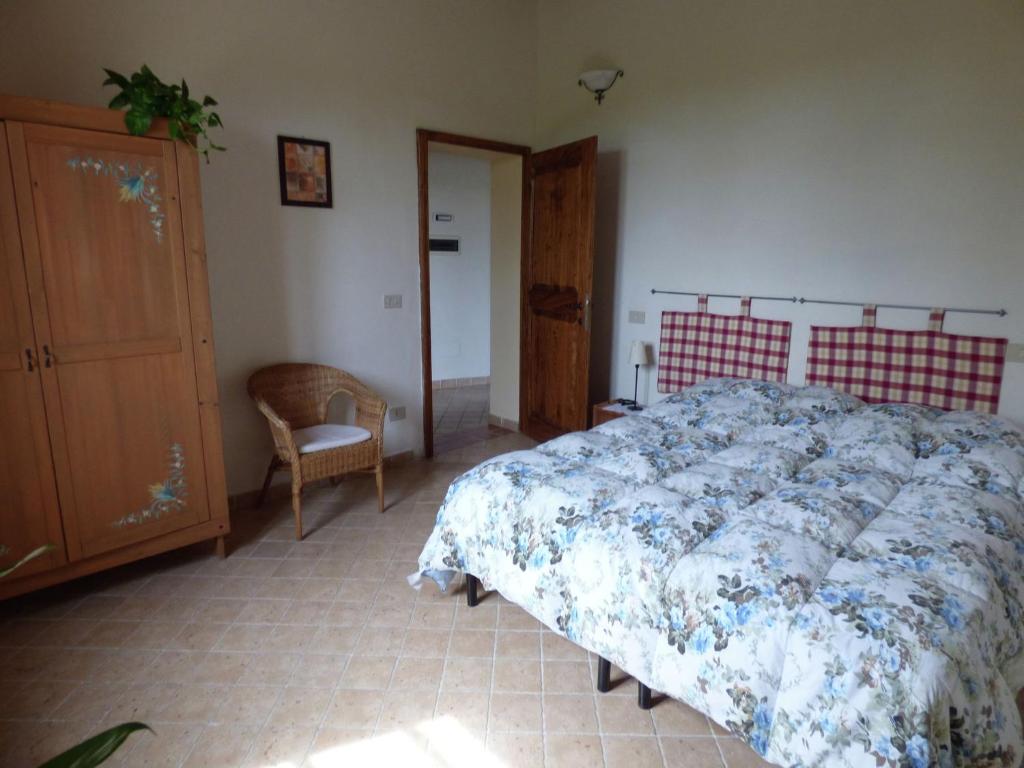 Posteľ alebo postele v izbe v ubytovaní Peaceful Farm Stay in the Tuscany
