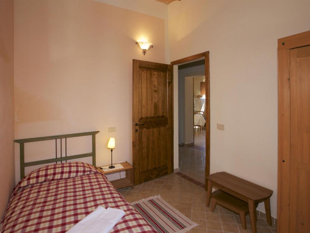 Posteľ alebo postele v izbe v ubytovaní Peaceful Farm Stay in the Tuscany