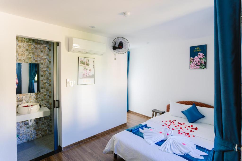 Postel nebo postele na pokoji v ubytování New World Hotel