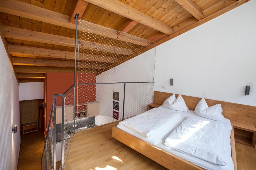 Postel nebo postele na pokoji v ubytování Aparthotel Schindlhaus und Koia Premium Apartments