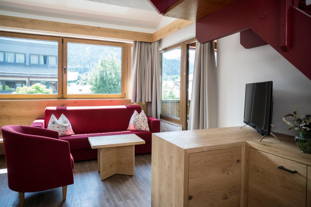TV a/nebo společenská místnost v ubytování Aparthotel Schindlhaus und Koia Premium Apartments