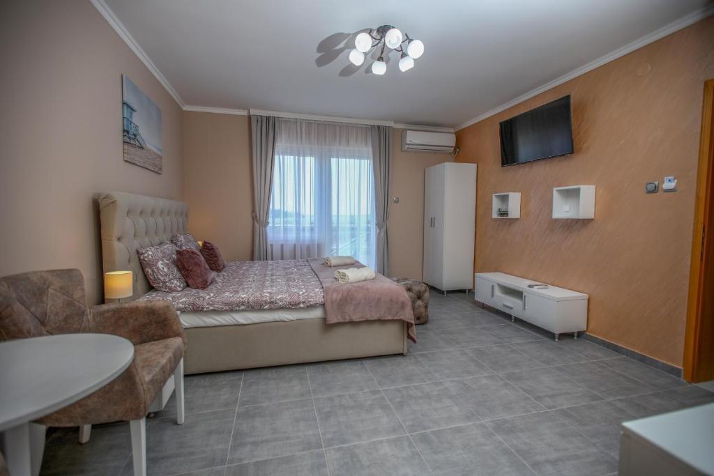 Postel nebo postele na pokoji v ubytování Dunavski Cvet