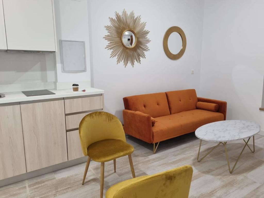 Kuchyň nebo kuchyňský kout v ubytování GLORIA SUITES