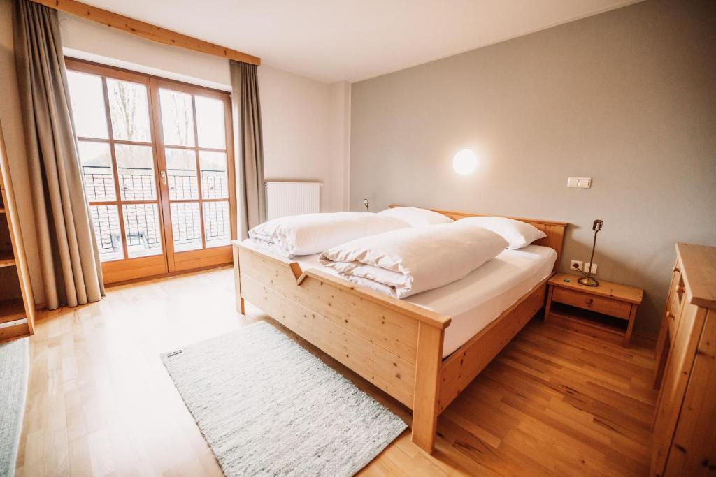 Postel nebo postele na pokoji v ubytování Weinhotel Maitz Wolfgang