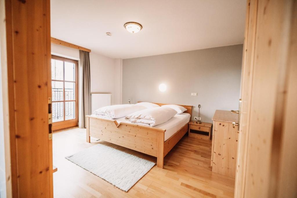 Postel nebo postele na pokoji v ubytování Weinhotel Maitz Wolfgang