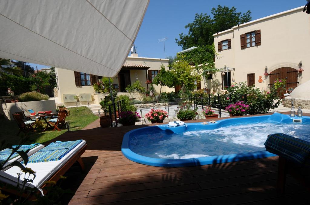 a hot tub sitting on top of a patio at Vasilion Agrotourism in Polis Chrysochous