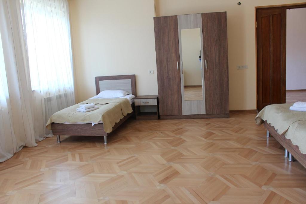Llit o llits en una habitació de Big House