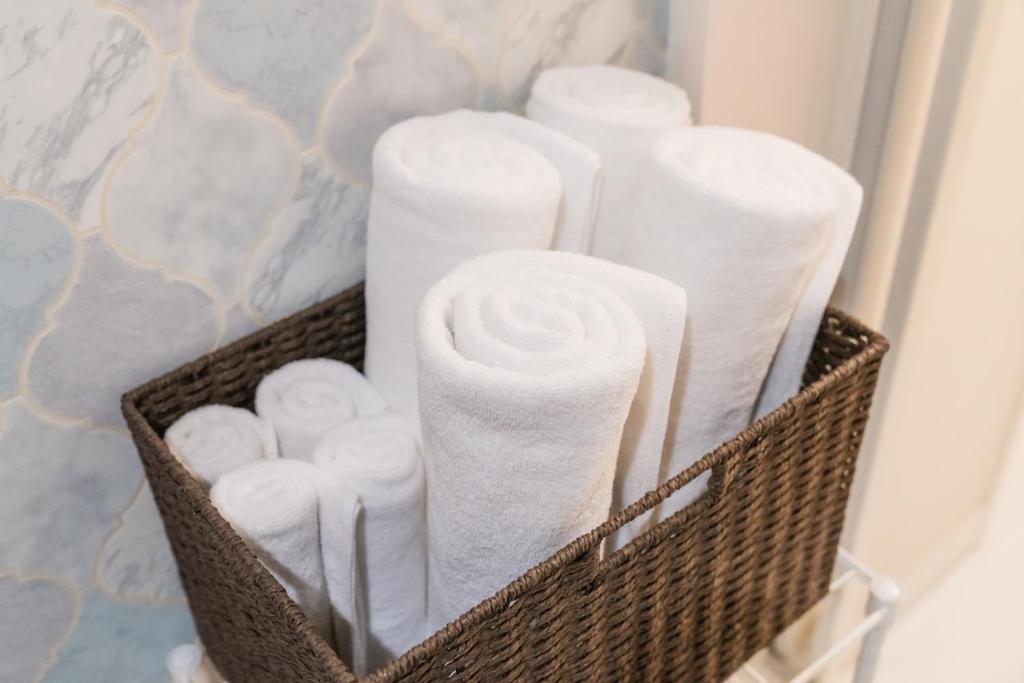 a basket filled with toilet paper in a bathroom at Hotel Santa Barbara Miyakojima Resort in Miyako-jima